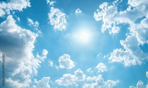 Blue sky with white clouds and a blue background. The sky is filled with stars and the clouds are scattered throughout the sky