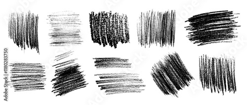 Set of black charcoal and pencil hatchings on rough textured granulated white paper. Vector illustration of brushes, textured spots, hand drawn in sweeping handwriting of varying density.