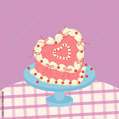 Pink heart shaped cake with candy sprinkles and ribbon decoration for Valentine's Day, weddings, birthdays and anniversaries.