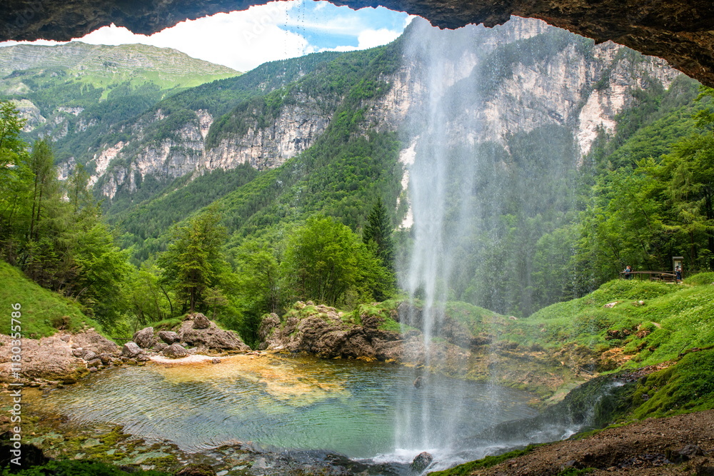 Goriuda Cave and Wtarefall, a spectacular landmark in Dolomites Alps Mountains Italy