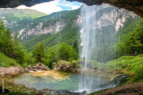 Obraz na płótnie Goriuda Cave and Wtarefall, a spectacular landmark in Dolomites Alps Mountains Italy w salonie