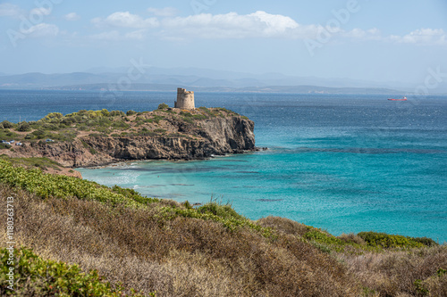 Obraz na płótnie Landscape of the cliffs of Sant'Antioco with a watchtower and the turquoise sea on a sunny day w salonie