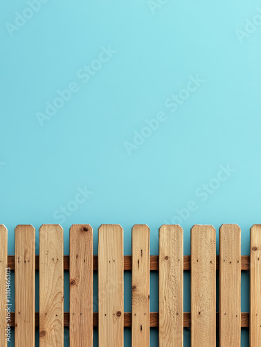 Wooden fence against a clear blue sky. photo