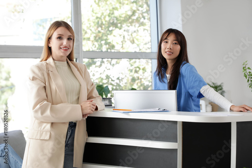 Female Asian medical intern...
