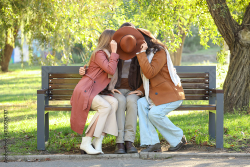 Two beautiful women kissing...