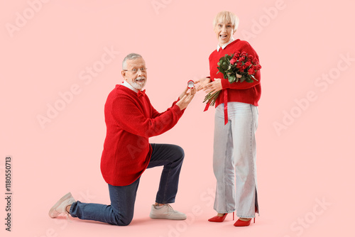 Happy mature man proposing ...