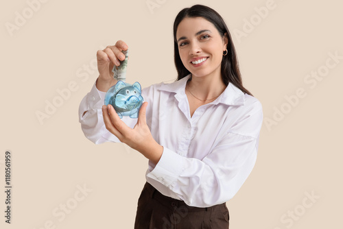 Beautiful woman putting mon...