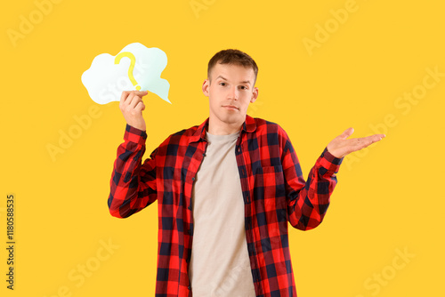 Young man holding speech bu...