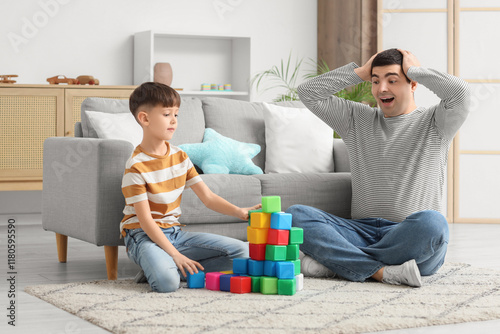 Surprised father and his li...