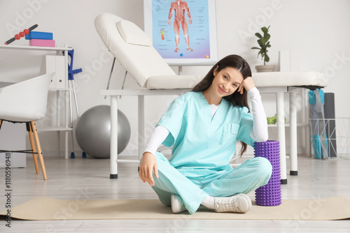 Female physiotherapist with...