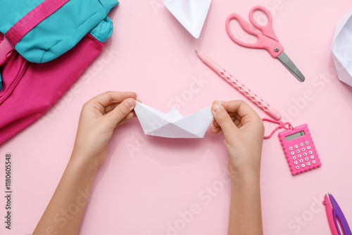 Child's hands with paper bo...
