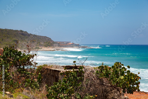 Playa Larga sand beach at the shore of the caribbean ocean in Santiago de Cuba photo