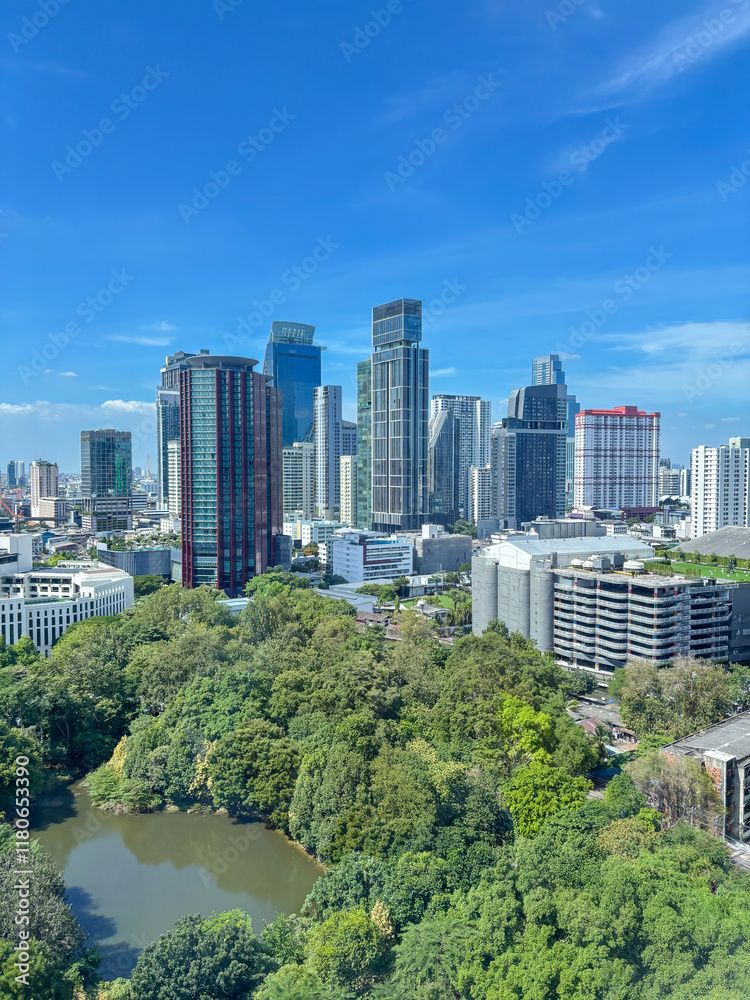 Fototapeta premium Aerial view of skyline Bangkok city, Thailand with blue sky