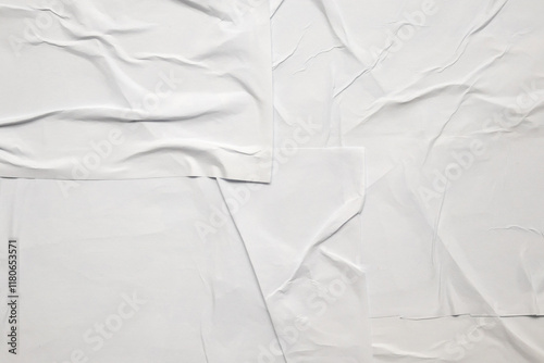 white crumpled and creased glued wrinkled paper poster texture background photo