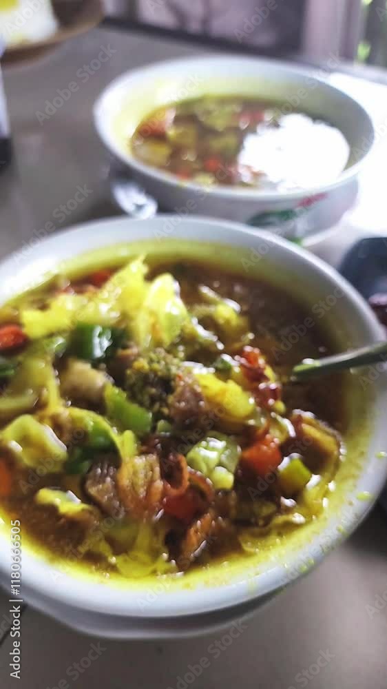 Tongseng is a dish consisting of goat or beef with cabbage and spicy, savory spices Tongseng is a dish consisting of goat or beef with cabbage and spicy, savory spices