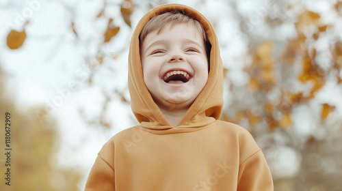Autumn Joy: A young boy wea...