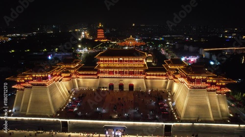 Stunning aerial view of Yingtian Gate illuminated at night in Luoyang, Henan showcasing the vibrant city landmark photo