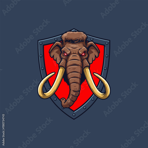 A fierce mammoth head with glowing red eyes is displayed within a metallic shield creating a powerful logo design.