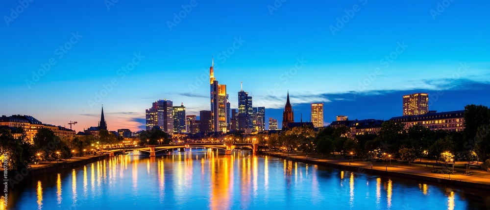 Fototapeta premium Evening skyline of Frankfurt presents a modern urban landscape with a beautiful cityscape view. Generative AI