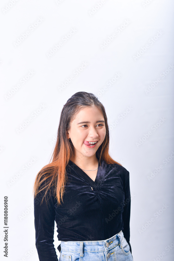 Smiling Woman in Casual Outfit Isolated Against a Bright White Background Smiling Woman in Casual Outfit Isolated Against a Bright White Background