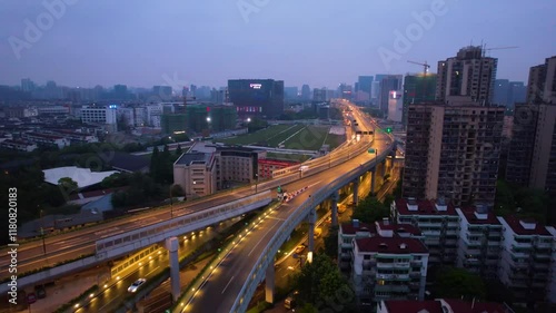 Elevated expressway lights up evening sky in Shangcheng District Hangzhou photo