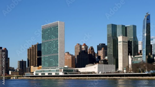  United Nations Headquarters from Roosevelt Island. View of NYC skyline at sunny day. High quality 4k footage