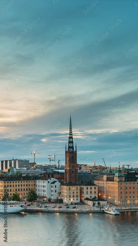 Stockholm, Sweden. Scenic Famous View Of Embankment In Old Town Of Stockholm At Summer. Gamla Stan In Summer Evening. Famous Popular Destination Scenic Place And UNESCO World Heritage Site Stockholm, Sweden. Scenic Famous View Of Embankment In Old Town Of Stockholm At Summer. Gamla Stan In Summer Evening. Famous Popular Destination Scenic Place And UNESCO World Heritage Site