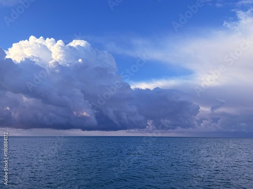 Dramatic sky clouds over sea at morning