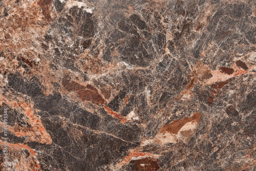 Close-up of dark brown marble with red and white veins. Close-up of dark brown marble with red and white veins.