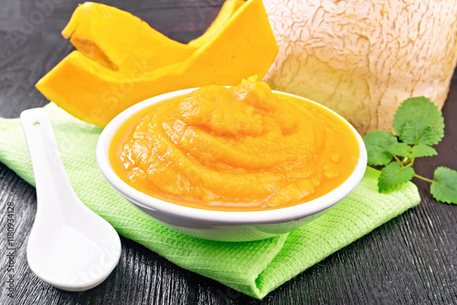Pumpkin puree in plate on board