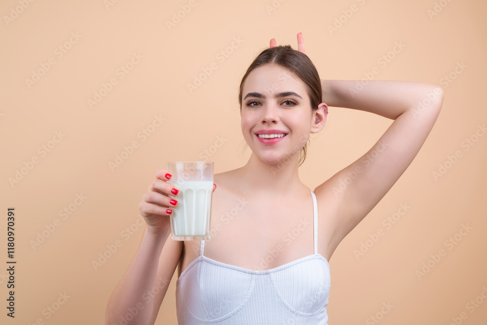 Happy woman drinking a fresh glass of milk. Young woman enjoy pure fresh milk. Thirsty woman hold glass milk. Healthy milk drinking. Happy woman drinking a fresh glass of milk. Young woman enjoy pure fresh milk. Thirsty woman hold glass milk. Healthy milk drinking.
