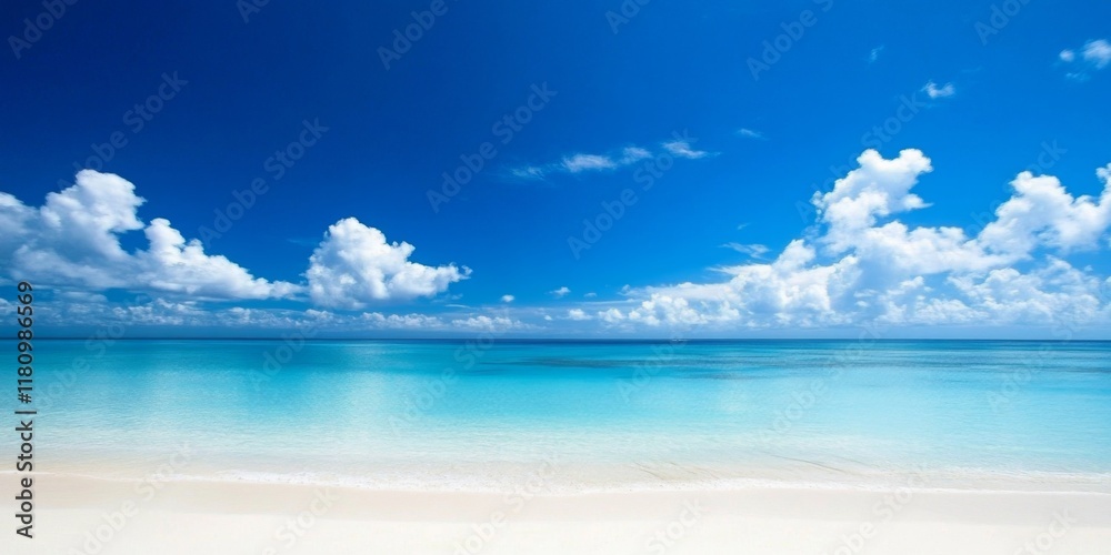 Fototapeta premium Vibrant blue sky complements the serene beach scene.
