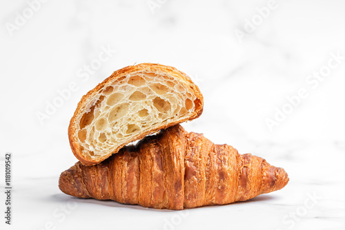 Croissants on white marble background