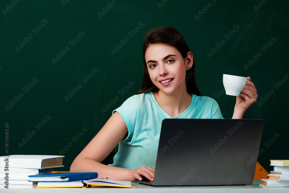 Student girl in classroom. School teenager girl in middle school. Schoolgirl in high school. Student drinking coffee in classroom. Coffee break in university. Student girl hold coffee cup. Student girl in classroom. School teenager girl in middle school. Schoolgirl in high school. Student drinking coffee in classroom. Coffee break in university. Student girl hold coffee cup.