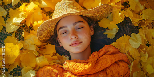 Relaxing autumn day young woman in yellow leaves outdoor photography natural setting peaceful atmosphere close-up perspective for emotional connection photo