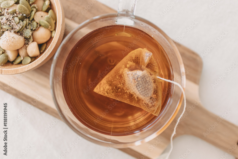 Set of mixed beans and hot tea on wooden plate. Set of mixed beans and hot tea on wooden plate.