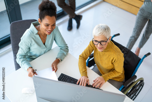 A bright, contemporary office space with a diverse group of professionals working together.