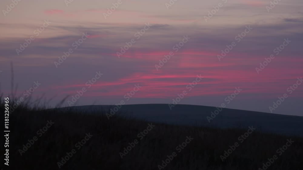 Colourful Sunset Sky Over The Countryside Of Dartmoor National Park In Devon, Southwest England. Static Shot Colourful Sunset Sky Over The Countryside Of Dartmoor National Park In Devon, Southwest England. Static Shot