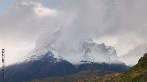a view of cuernos del paine  or 'Paine horns' on a stormy autumn morning at torres del paine national park in patagonia, chile