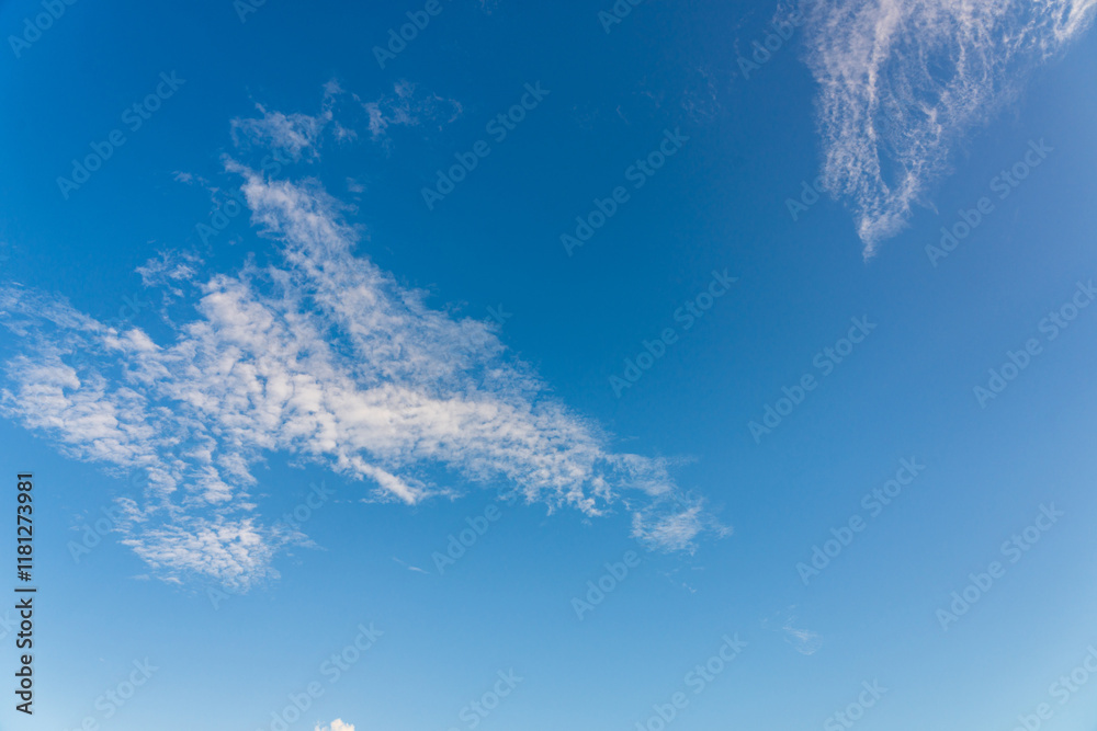Expansive Blue Sky with Fluffy Clouds for Tranquil Landscapes Expansive Blue Sky with Fluffy Clouds for Tranquil Landscapes