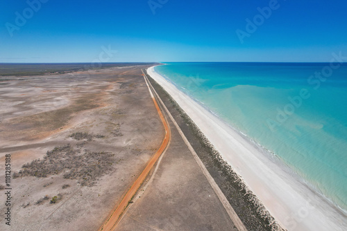 Aerial view of eighty mile beach with clear blue ocean and sandy shore, Kimberley Region, Australia.