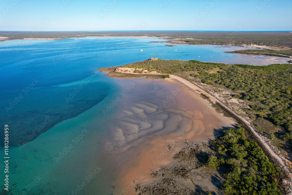 Aerial view of serene mudflats and beautiful coastline with blue water, Ardyaloon, Western Australia. Aerial view of serene mudflats and beautiful coastline with blue water, Ardyaloon, Western Australia.