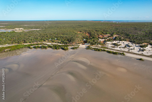 Aerial view of tranquil mudflats and beautiful coastline with Cygnet Bay Pearl Farm, Mission Bay, Dampier Peninsula, Kimberley Region, Australia. photo