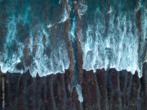 Aerial view of beautiful sandy beach with azure ocean waves, Badung, Indonesia. photo