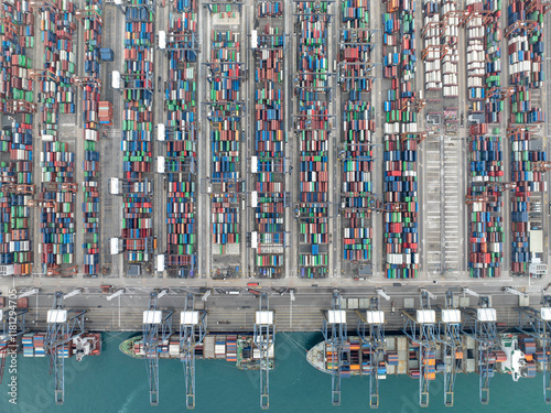 Aerial view of busy port with colorful containers and cranes, Kwai Tsing, Hong Kong. photo