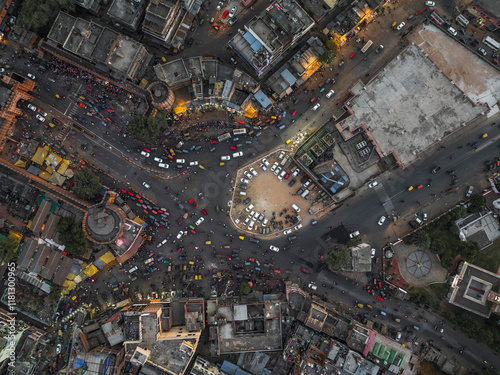 Aerial view of a bustling traffic jam in a vibrant urban landscape with buildings and vehicles, Sindhi Camp, Jaipur, India.