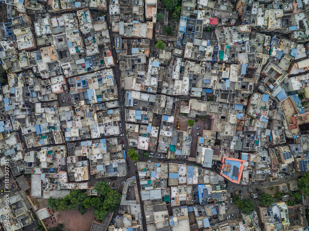 Aerial view of vibrant and colorful rooftops in a dense urban landscape, Jodhpur, India. Aerial view of vibrant and colorful rooftops in a dense urban landscape, Jodhpur, India.
