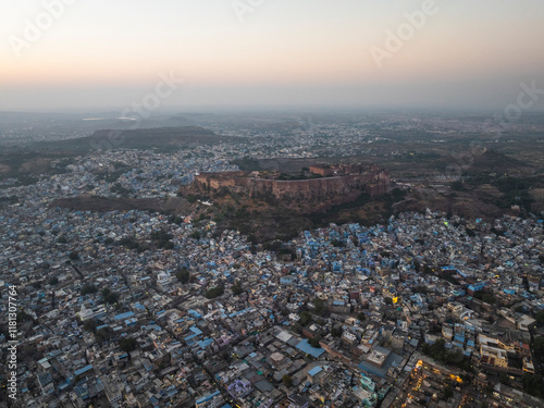 Aerial view of mehrangarh fort overlooking the vibrant cityscape at sunset, Jodhpur, India. photo