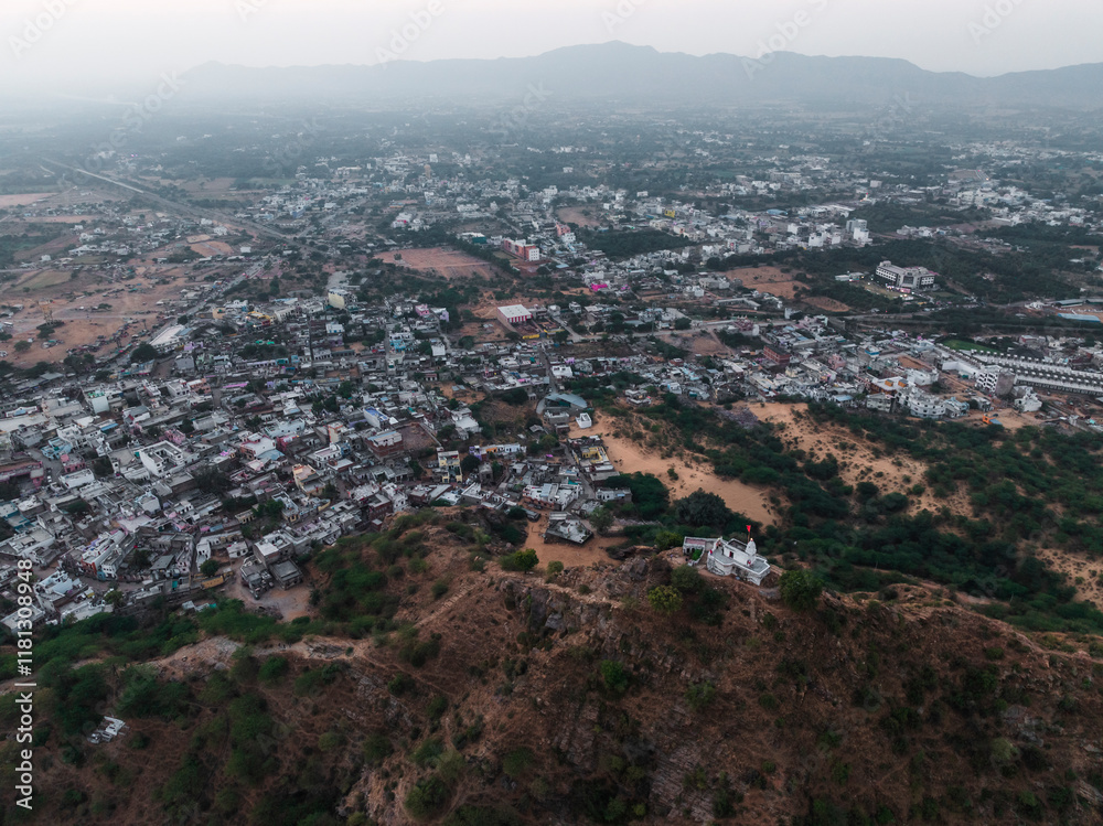 Aerial view of beautiful Pushkar town surrounded by hills and mountains, Rajasthan, India. Aerial view of beautiful Pushkar town surrounded by hills and mountains, Rajasthan, India.