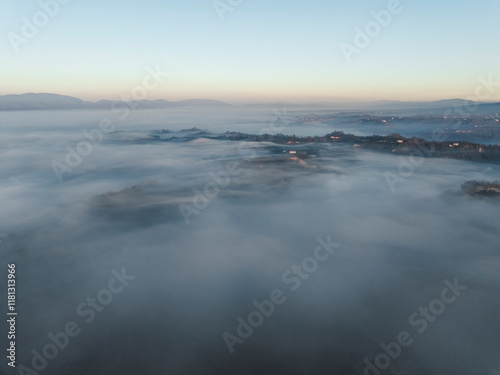 Wallpaper Mural Aerial view of balze valdarno shrouded in fog and mist at sunrise, tuscany, reggello, italy. Torontodigital.ca